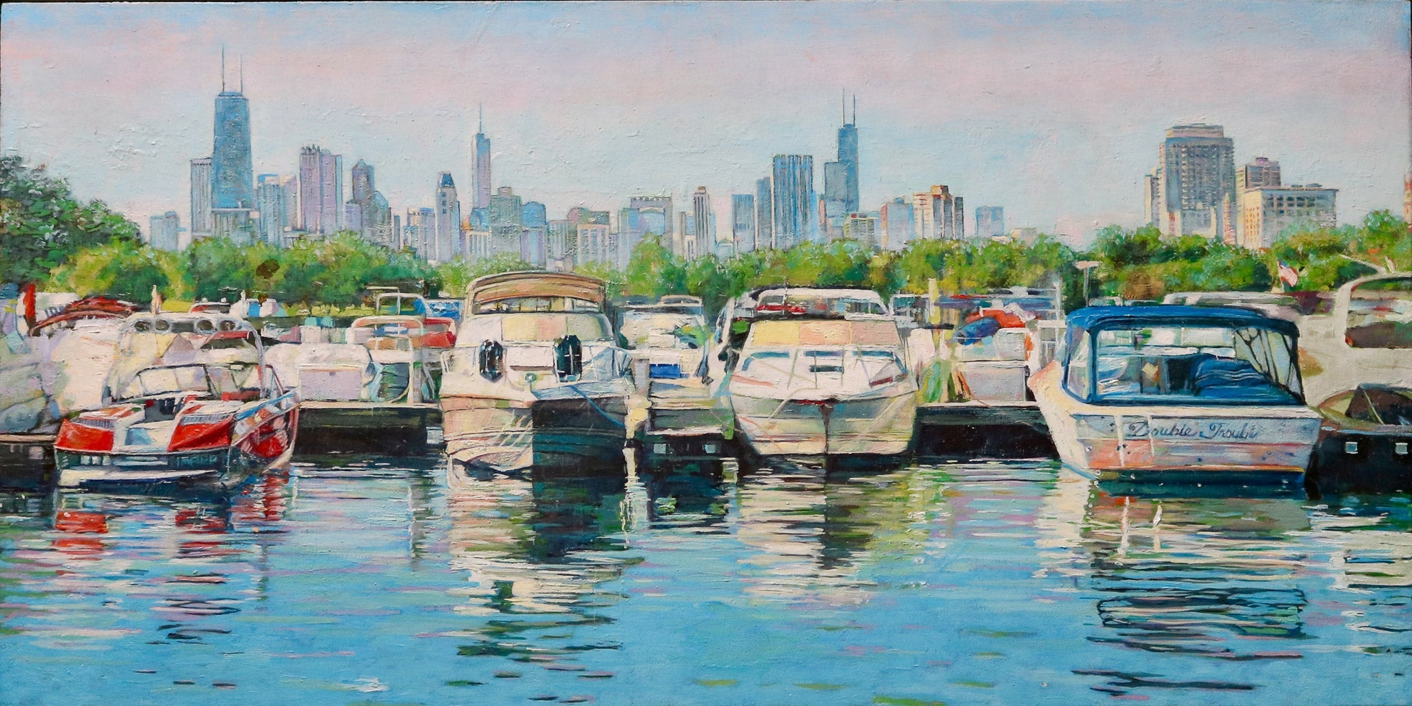 skyline of Chicago featuring white moon behind the Willis Tower 